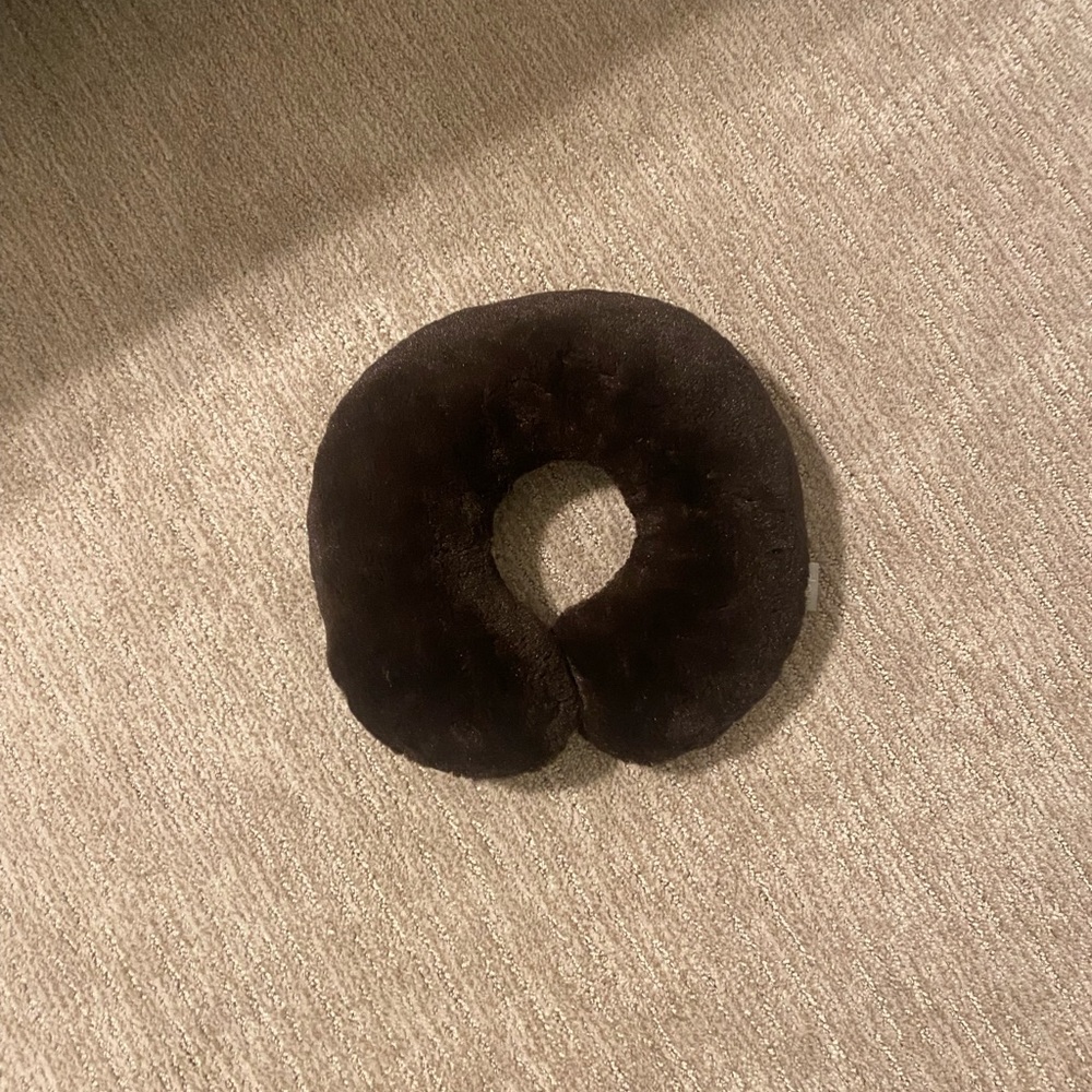 Brookstone dark brown travel pillow